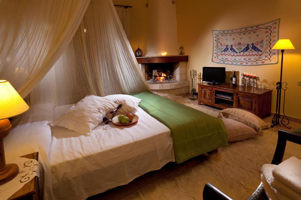 Postel nebo postele na pokoji v ubytování Agnantio studios & suites
