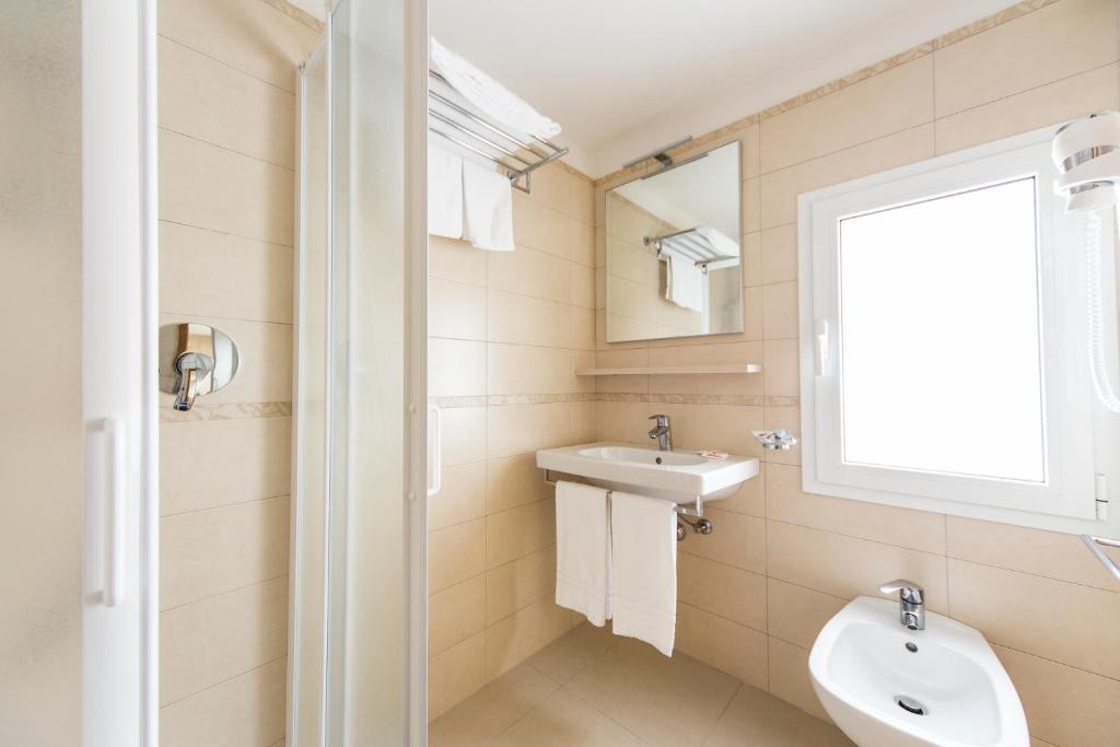 Koupelna v ubytování Hotel Silvia