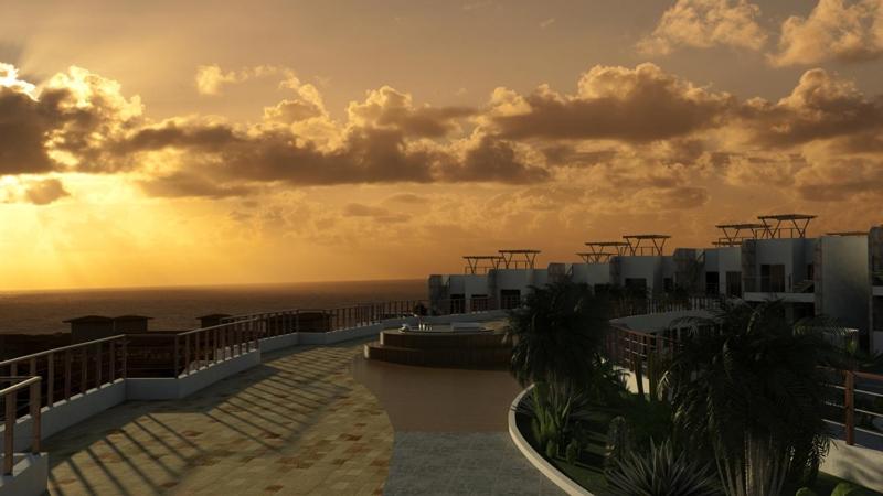vista para o oceano a partir de um resort ao pôr-do-sol em Brisas do Amor Flat com Piscina Privada em Pipa