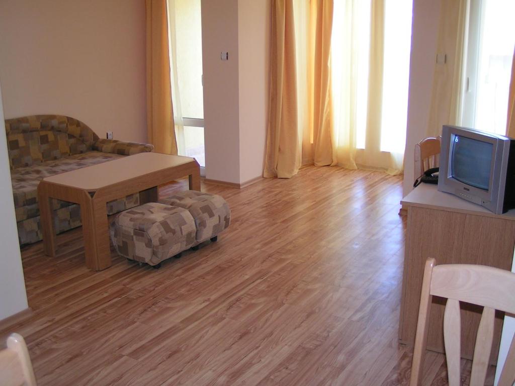 TV a/nebo společenská místnost v ubytování Apart Hotel Hetodon