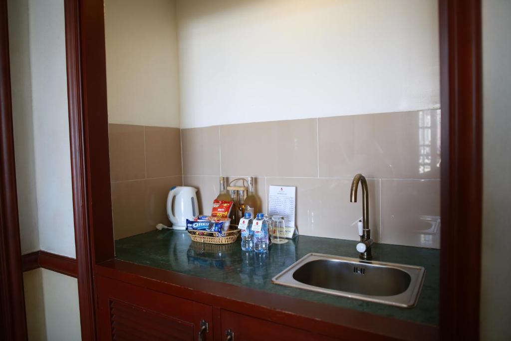 Kuchyň nebo kuchyňský kout v ubytování Sammy Dalat Hotel