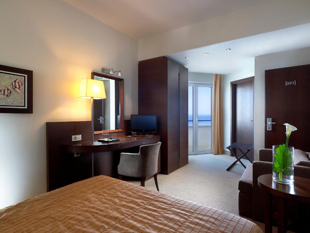 Postel nebo postele na pokoji v ubytování Irida Hotel