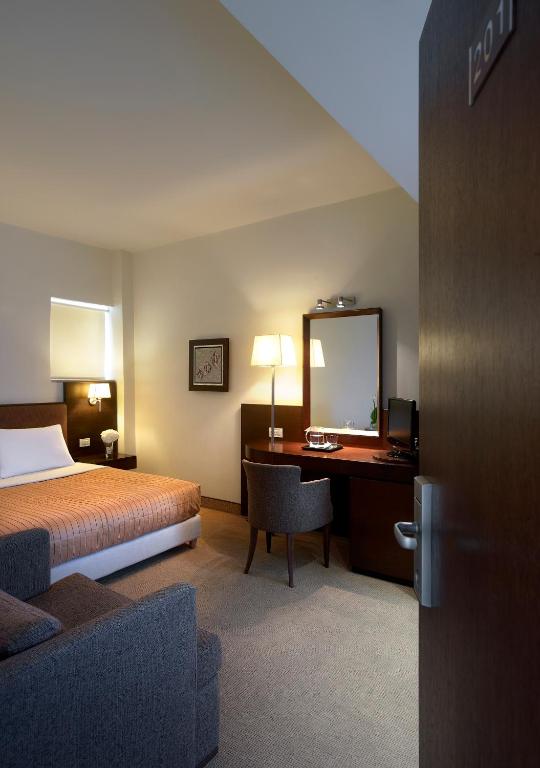 Postel nebo postele na pokoji v ubytování Irida Hotel