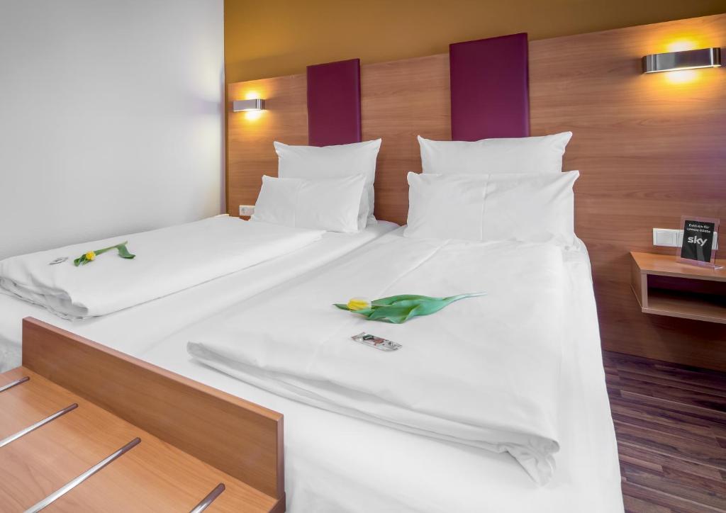 TIPTOP Hotel Burgschmiet Garni - Resim 20