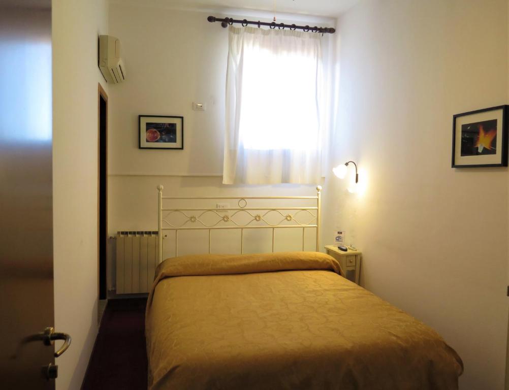 Postel nebo postele na pokoji v ubytování Al Soffiador