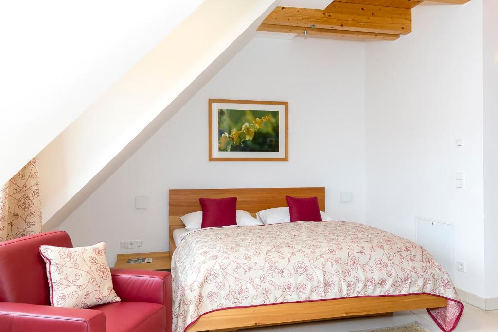 Postel nebo postele na pokoji v ubytování Moor-Rosl Apartmenthotel