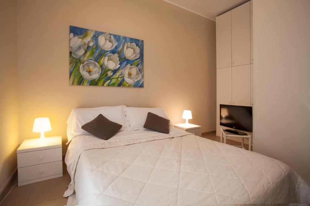 Кровать или кровати в номере Residence Sole Mare Alaxi Hotels