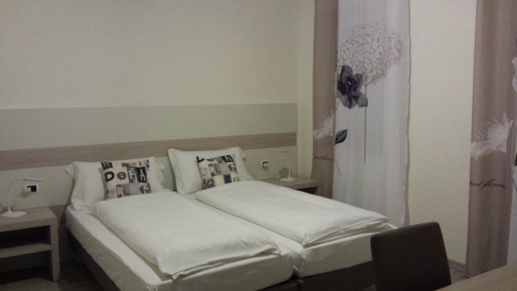 Postel nebo postele na pokoji v ubytování B&B Nuova Ostiglia