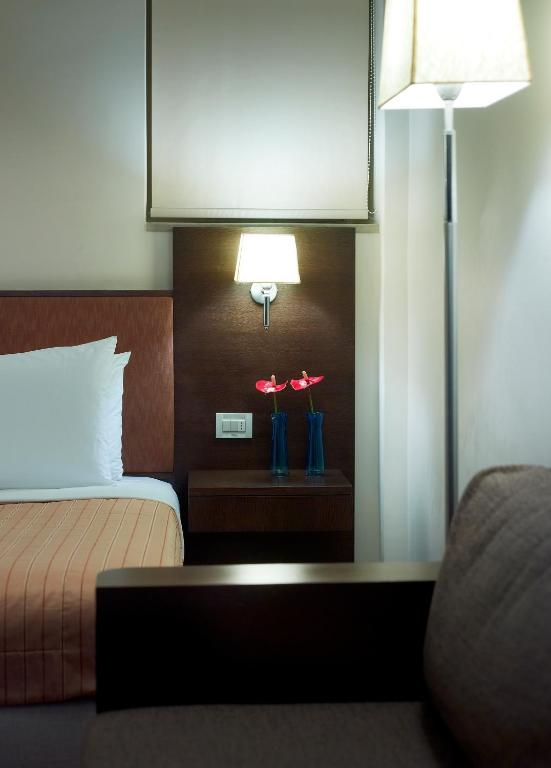 Postel nebo postele na pokoji v ubytování Irida Hotel