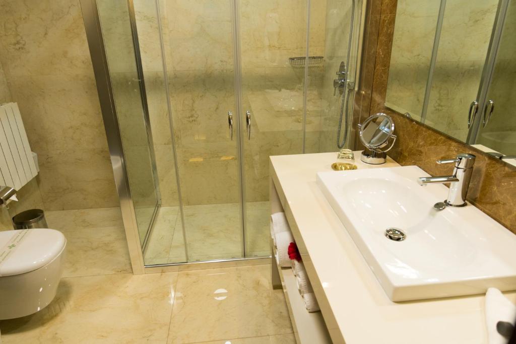 Koupelna v ubytování Boutique Hotel Kotoni