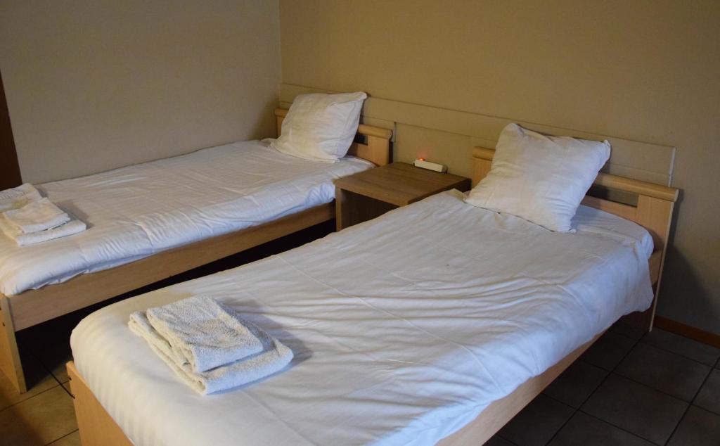 Postel nebo postele na pokoji v ubytování Condo Gardens Antwerp