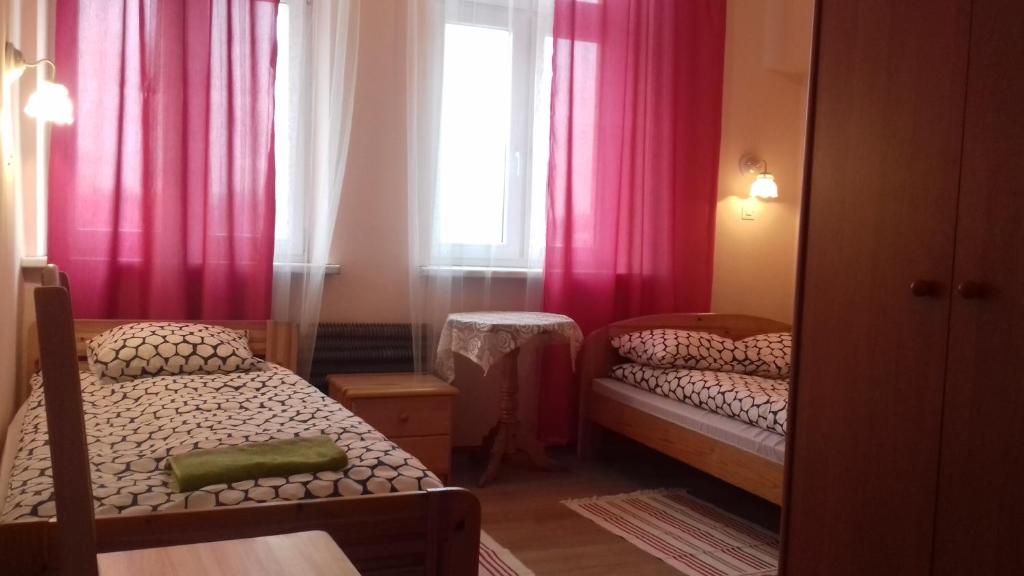 Posteľ alebo postele v izbe v ubytovaní Hostel Retro