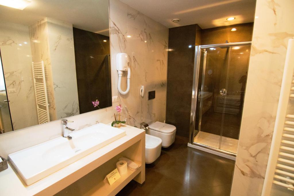 Koupelna v ubytování Boutique Hotel Kotoni