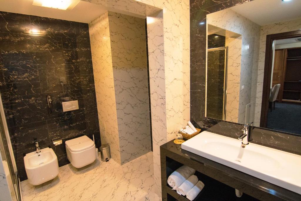 Koupelna v ubytování Boutique Hotel Kotoni