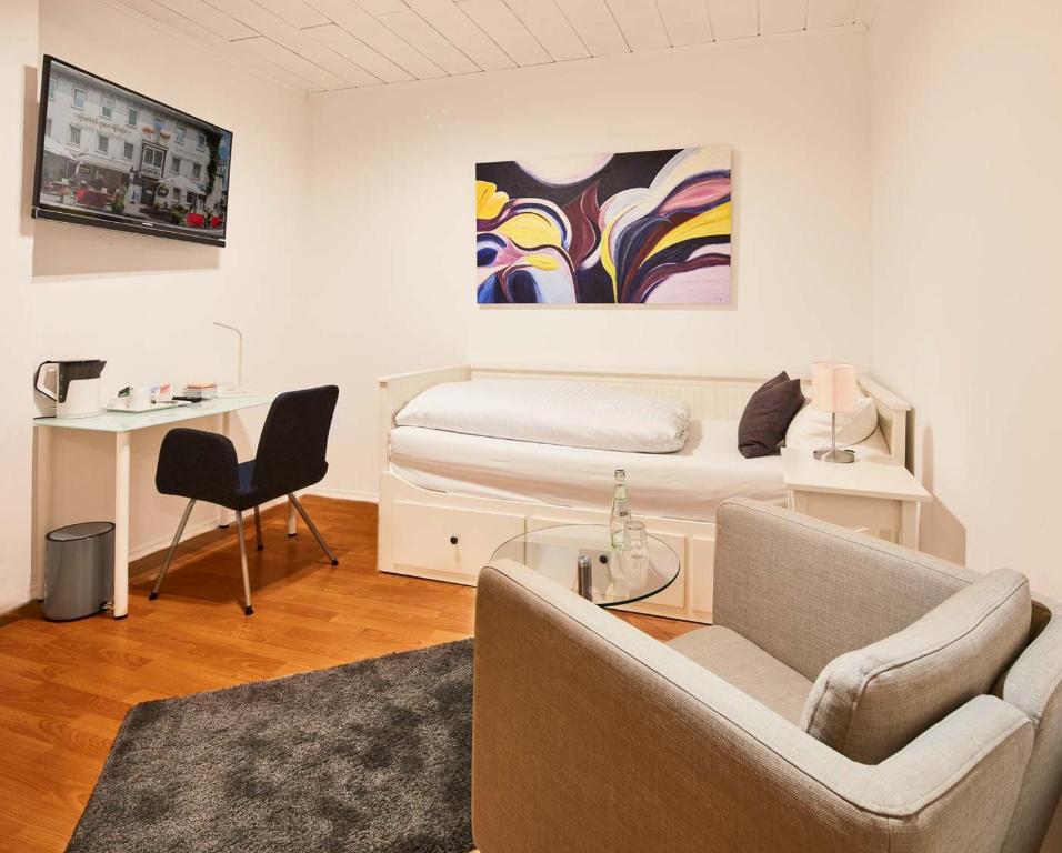 TV a/nebo společenská místnost v ubytování Hotel zur Post