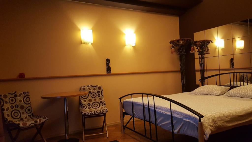 Una cama o camas en una habitación de Hospitality Centrum- River