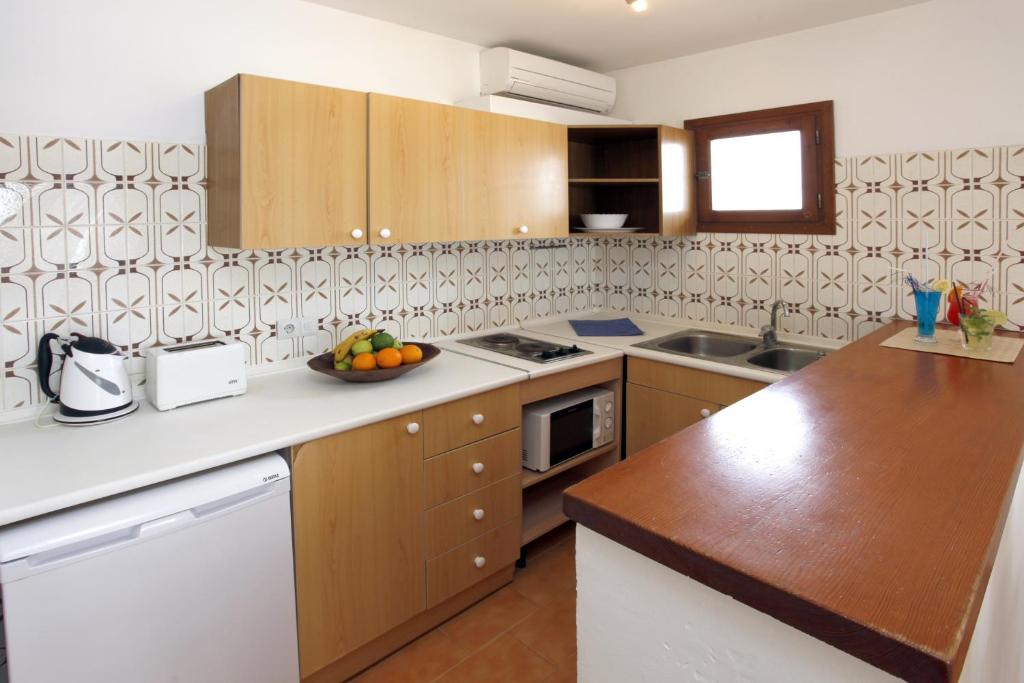 Kuchyň nebo kuchyňský kout v ubytování Typic Sandic Apartments