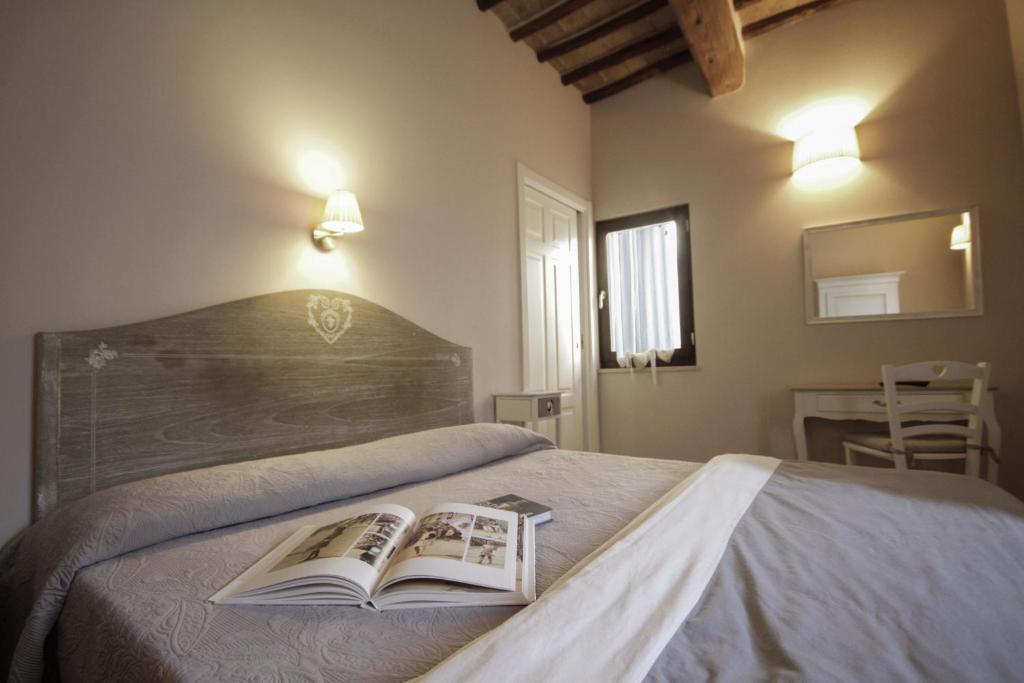 Posteľ alebo postele v izbe v ubytovaní B&B Il Senesino