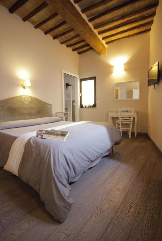 Posteľ alebo postele v izbe v ubytovaní B&B Il Senesino
