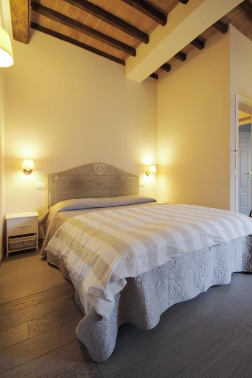 Posteľ alebo postele v izbe v ubytovaní B&B Il Senesino