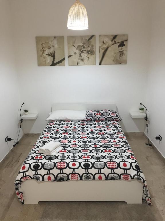 Łóżko lub łóżka w pokoju w obiekcie B&B Scilla Mare