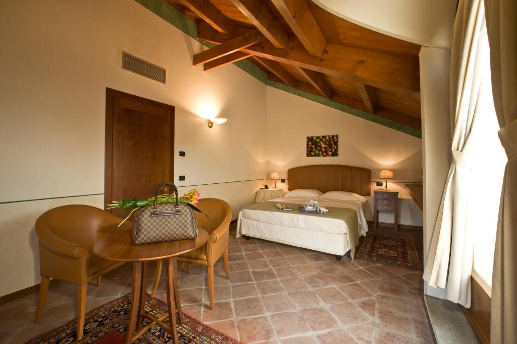 Ένα ή περισσότερα κρεβάτια σε δωμάτιο στο Albergo dell'Agenzia