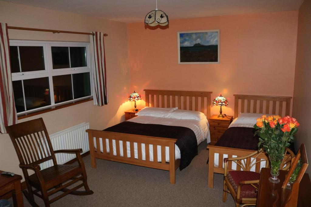 Postel nebo postele na pokoji v ubytování An Portán Guest House
