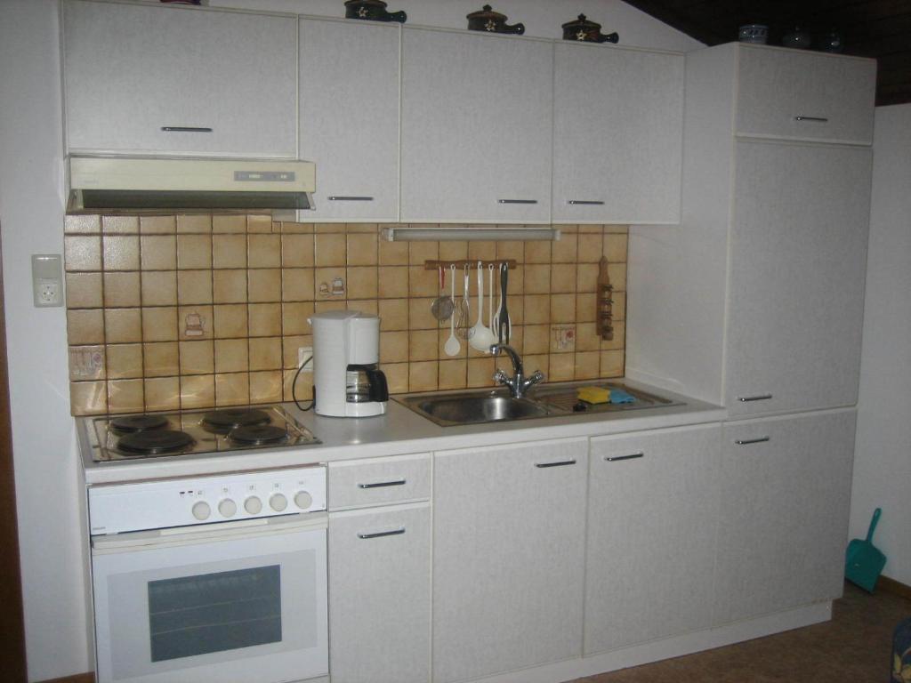 Una cocina o cocineta en Funerhof