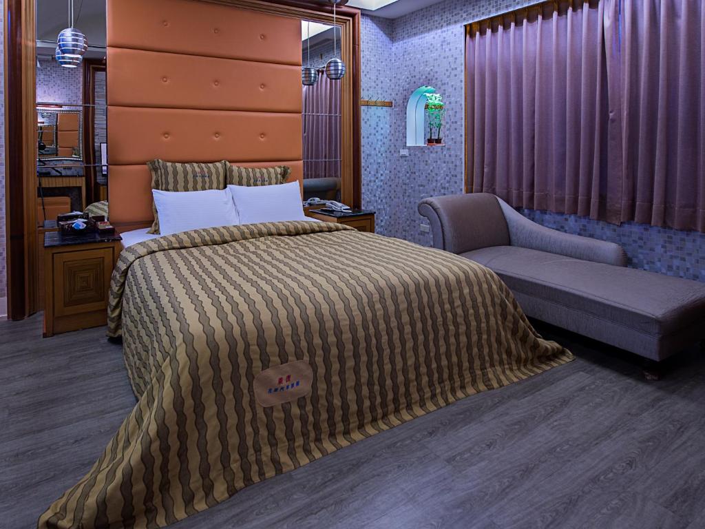 Postel nebo postele na pokoji v ubytování Lai Yin Motel