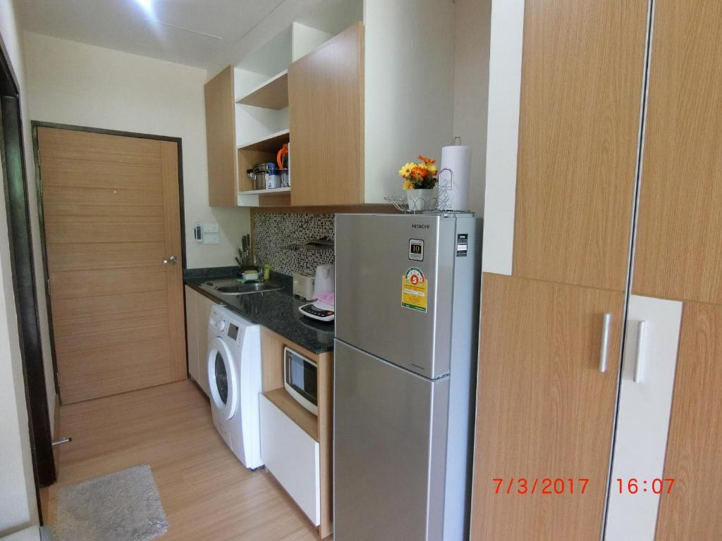 Kuchyň nebo kuchyňský kout v ubytování The Naithorn Condo Unit 401