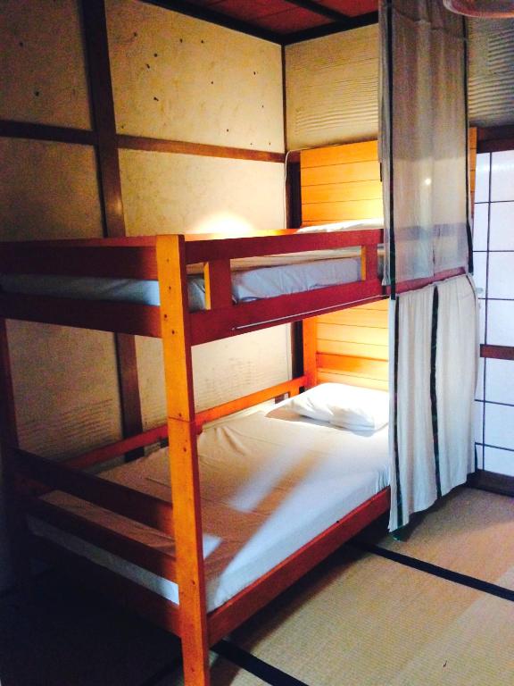 Voodi või voodid majutusasutuse Guest House YAMASHITA-YA toas
