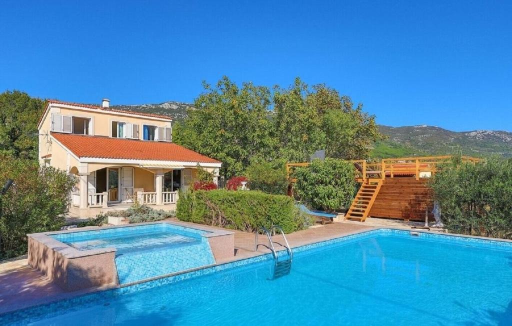 Two houses , heated pool, sauna