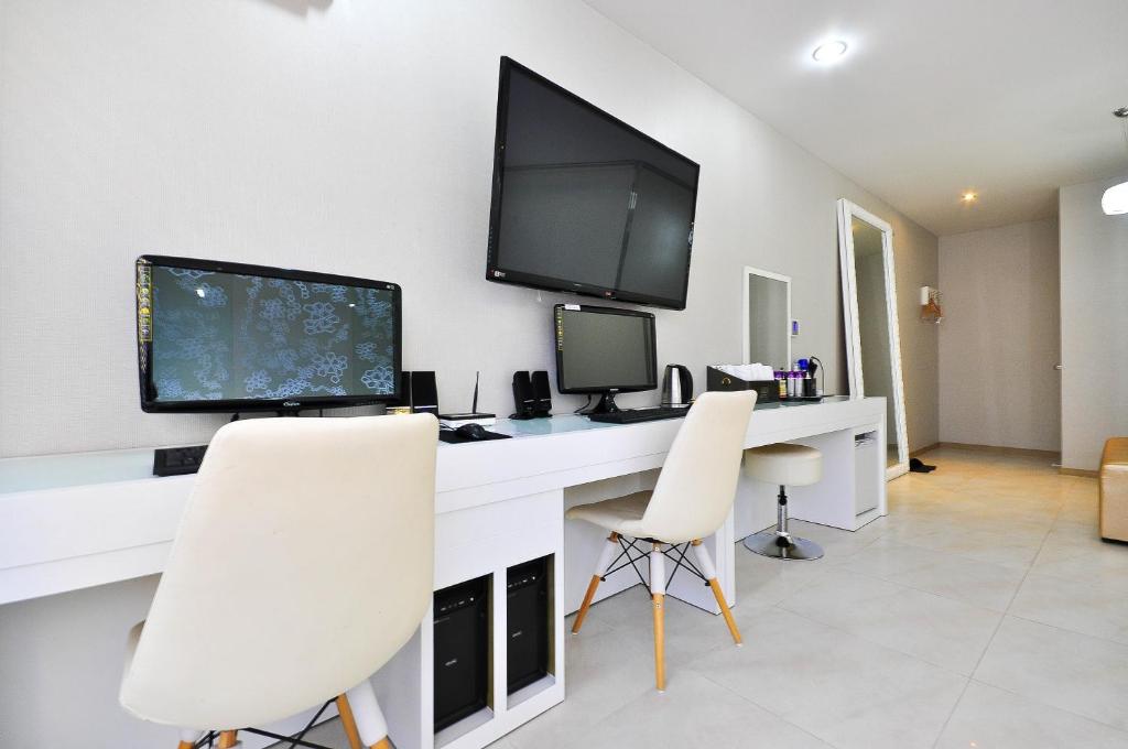 TV a/nebo společenská místnost v ubytování Boutique Hotel Aria Nampo