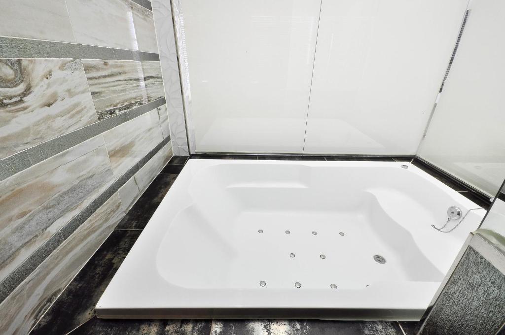 Koupelna v ubytování Boutique Hotel Aria Nampo