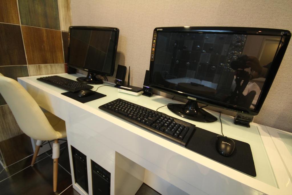 TV a/nebo společenská místnost v ubytování Boutique Hotel Aria Nampo