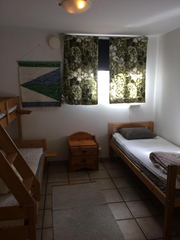 Postel nebo postele na pokoji v ubytování Bengtssons Loge