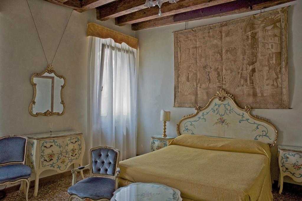 Posteľ alebo postele v izbe v ubytovaní B&B Luxury San Firmino Canal View