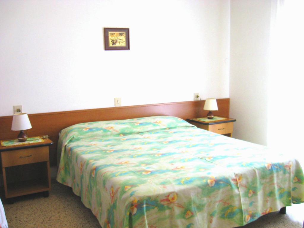 A bed or beds in a room at B&B Garnì Da Vito