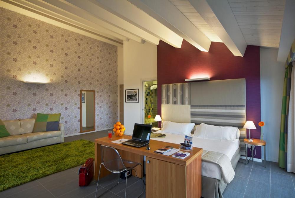 Posezení v ubytování Poggio Del Sole Hotel