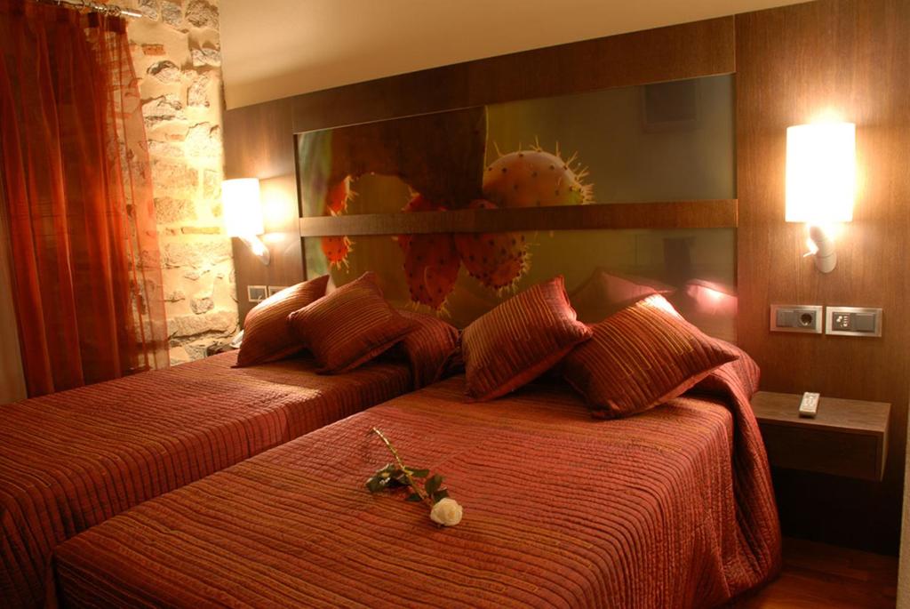 Postel nebo postele na pokoji v ubytování Hotel Los Usías
