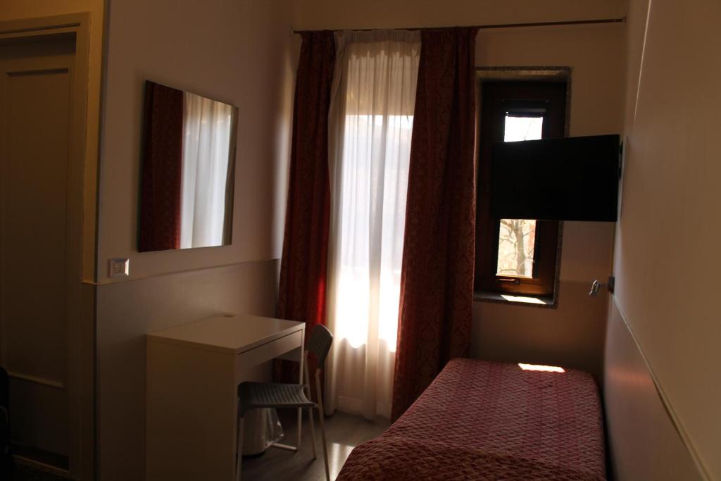 Postel nebo postele na pokoji v ubytování Alla Bianca Hotel