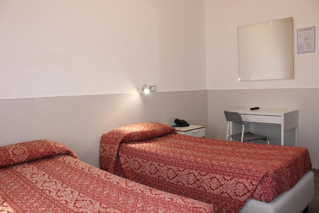Postel nebo postele na pokoji v ubytování Alla Bianca Hotel