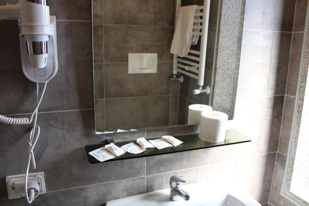 Koupelna v ubytování Alla Bianca Hotel
