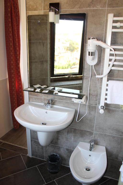 Koupelna v ubytování Alla Bianca Hotel