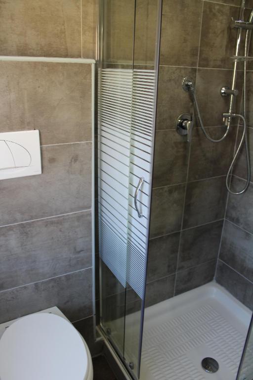 Koupelna v ubytování Alla Bianca Hotel