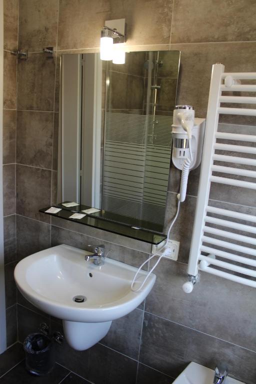 Koupelna v ubytování Alla Bianca Hotel