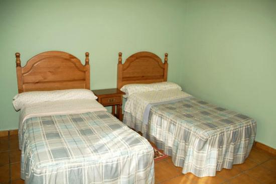 La Penona tesisinde bir odada yatak veya yataklar