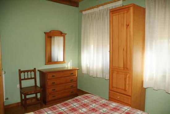 Postel nebo postele na pokoji v ubytování La Penona