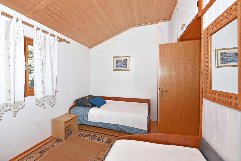 Posteľ alebo postele v izbe v ubytovaní Apartment Tome Diklo