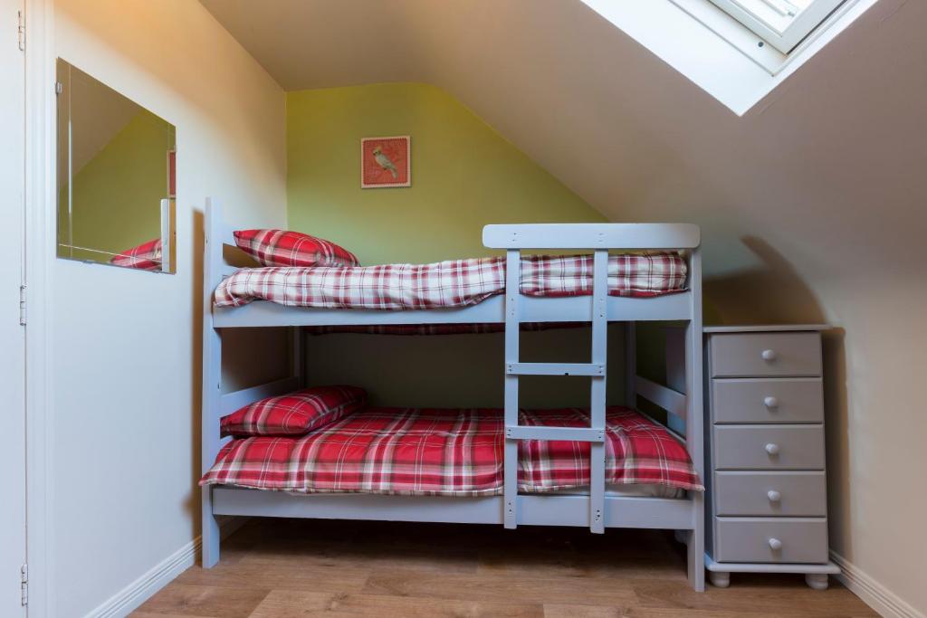 Postel nebo postele na pokoji v ubytování Lakeland House